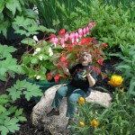 "I want to be tiny in my garden, sitting on the rocks," Robin Botie's friend in Ithaca, New York had told her. So she photoshopped her tiny, in her garden.
