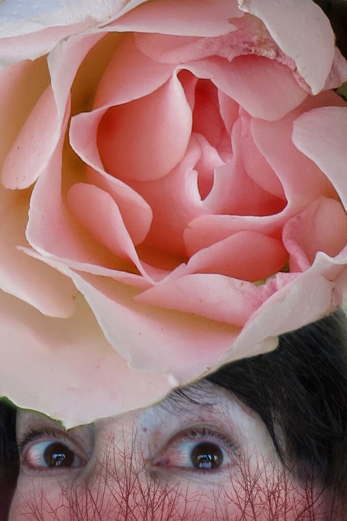With eyes bloodshot from crying, Robin Botie of Ithaca, New York, Photoshops a rose over her rosy veined face.