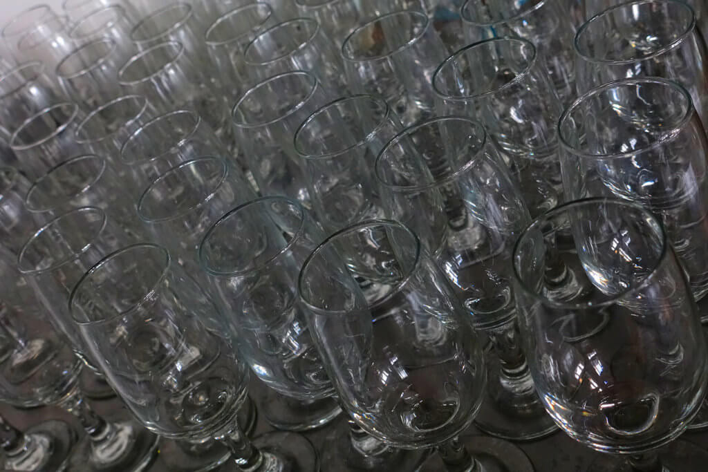 Robin Botie of Ithaca, New York, photographs wineglasses lined up for Cornell's Adult University wine tasting course.