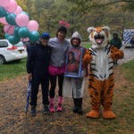Robin Botie of Ithaca, New York, posing with friendly folks at the 2016 Annual Walkathon for the Cancer Resource Center of the Finger Lakes.