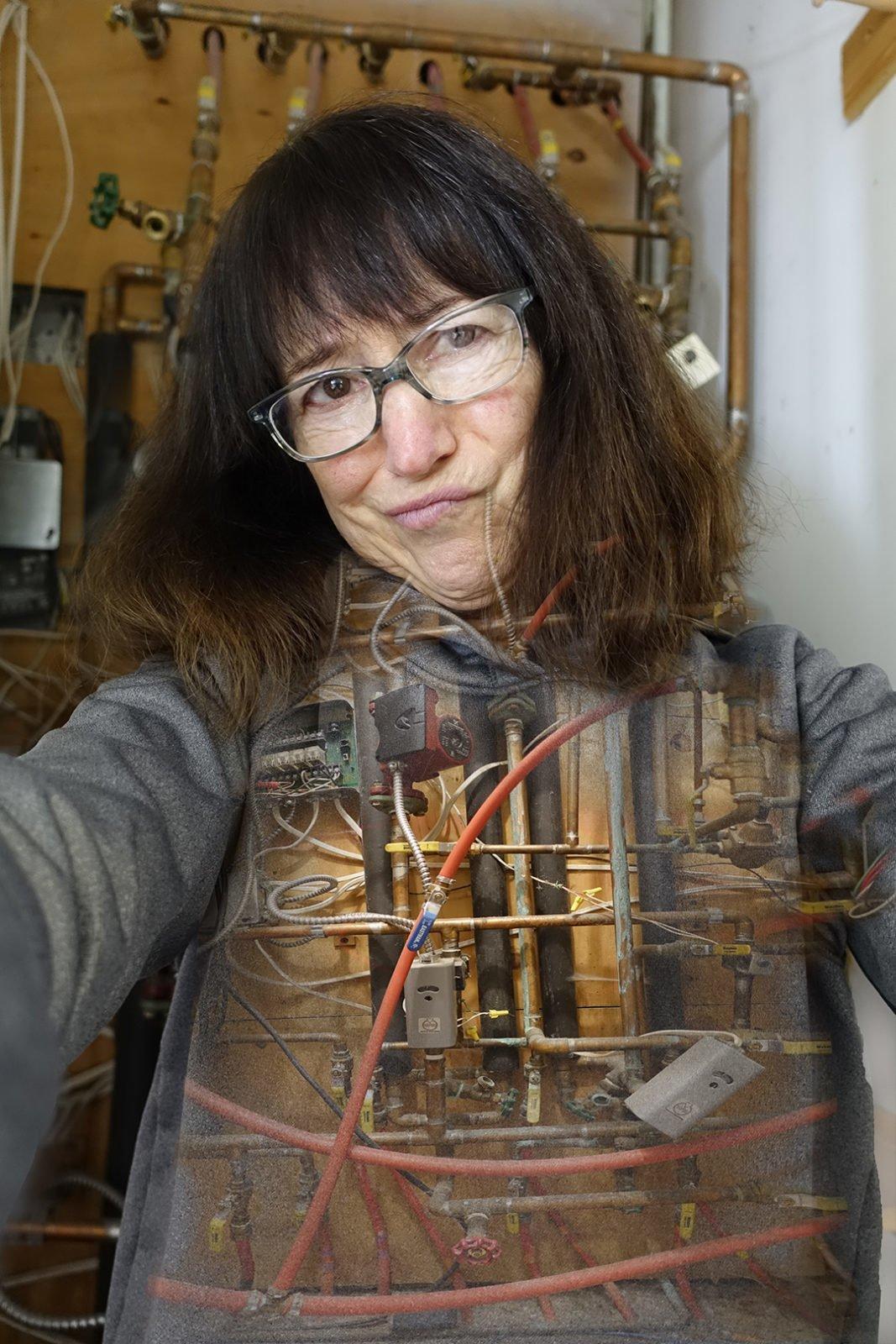 Robin Botie of Ithaca, New York photoshops her old heating system as she puts in new heat pumps and hopes to live to be 100.