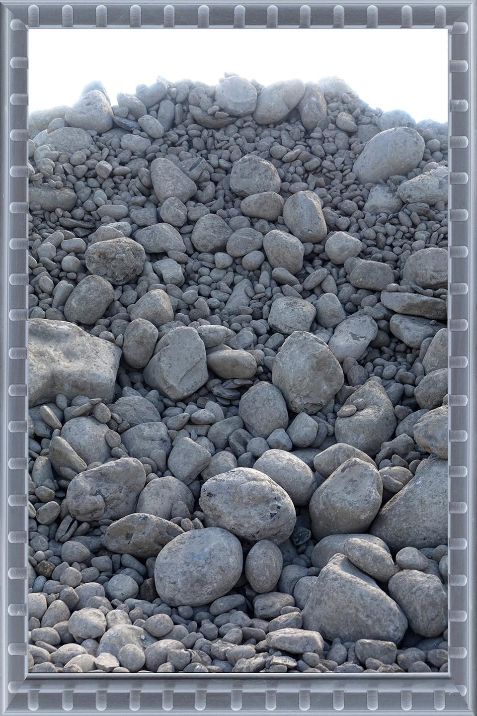 Robin Botie of Ithaca, New York, photoshops a fabricated landscape of rocks and stones in her dealing with grief and loss and depression.