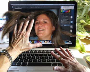 Robin Botie in Ithaca, New York, hovers over computer screen showing her daughter, Marika Warden, who died of leukemia at the age of 20.