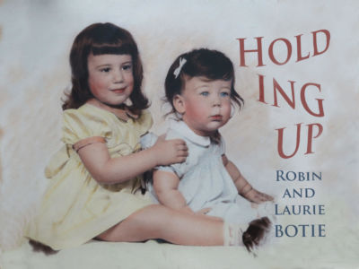 Robin Botie of Ithaca, New York, as a toddler holding up her younger sister, Laurie Botie.